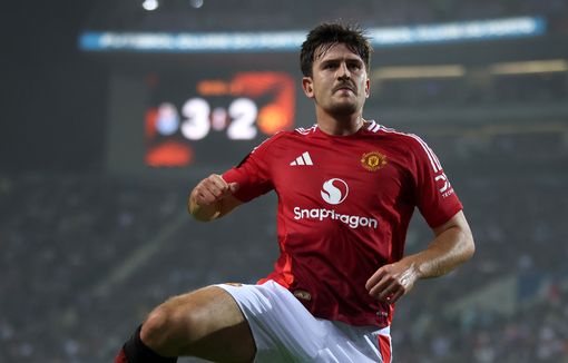 Harry Maguire rescues point for 10-man Manchester United